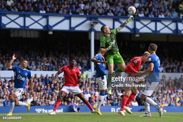 Jordan Pickford of Everton punches the ball clear during the Premier League match between Everton FC and Nottingham Forest at Goodison Park on August...