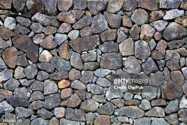 stacked stone retaining wall - stone wall stock pictures, royalty-free photos & images