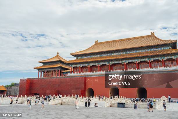 Labours carry out renovation work on the Meridian Gate in the Forbidden City on August 19, 2022 in Beijing, China.