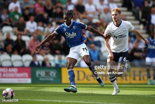 Vakoun Issouf Bayo of Watford shoots at goal under pressure from Liam Lindsay of Preston North End during the Sky Bet Championship between Preston...