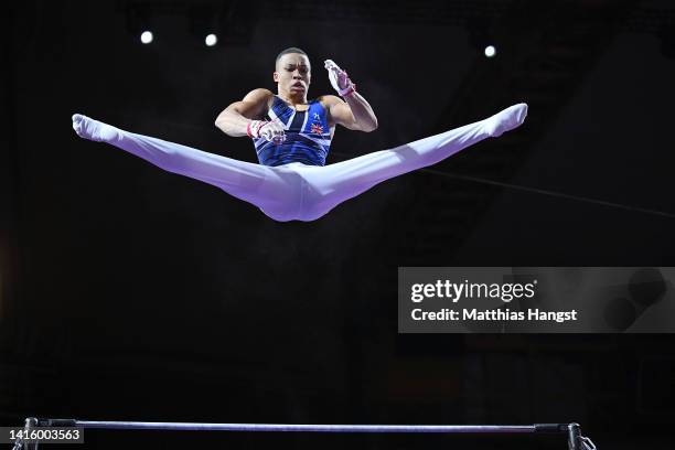 Joe Fraser of Great Britain competes in the Horizontal Bar in the Men's Senior Team Final in during the Artistic Gymnastics competition on day 10 of...