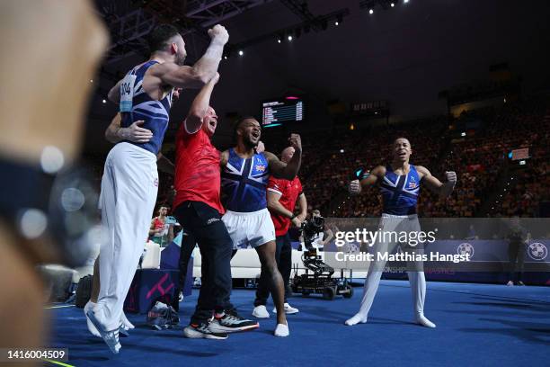 Team Great Britain celebrate during the Men's Team Final Artistic Gymnastics competition on day 10 of the European Championships Munich 2022 at...