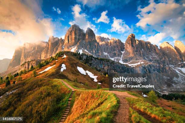 dolomites, three peaks of lavaredo. panoramic image of italian dolomites with famous three peaks of lavaredo (tre cime di lavaredo) south tyrol, italy, europe at summer sunset - dolomites italy stock pictures, royalty-free photos & images