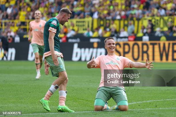 Niklas Schmidt of SV Werder Bremen celebrates after scoring their team's second goal during the Bundesliga match between Borussia Dortmund and SV...