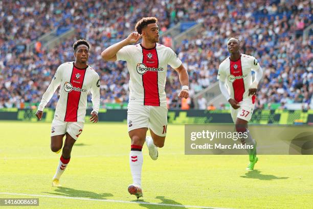 Che Adams of Southampton celebrates after scoring their team's first goal during the Premier League match between Leicester City and Southampton FC...