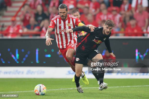 Christopher Trimmel of 1.FC Union Berlin battles for possession with Timo Werner of RB Leipzig during the Bundesliga match between 1. FC Union Berlin...