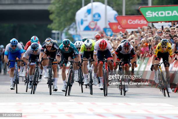 Kaden Groves of Australia and Team BikeExchange - Jayco, Itamar Einhorn of Israel and Team Israel - Premier Tech, Tim Merlier of Belgium and Team...