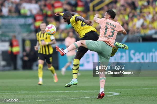 Anthony Modeste of Dortmund and Milos Veljkovic of Bremen go up for a header during the Bundesliga match between Borussia Dortmund and SV Werder...