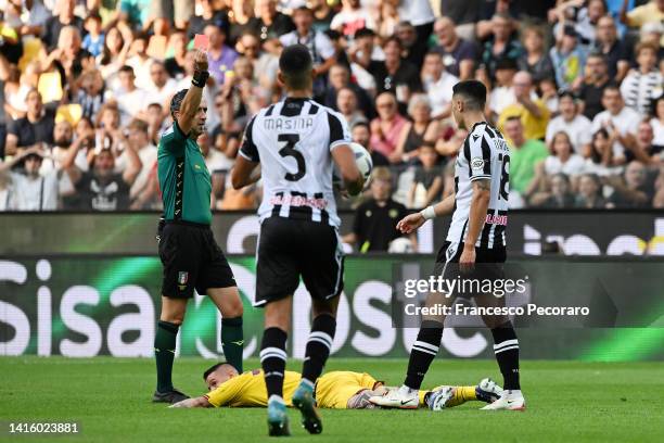 Referee Gianluca Aureliano shows red card to Nehuen Perez of Udinese Calcio during the Serie A match between Udinese Calcio and Salernitana at Dacia...