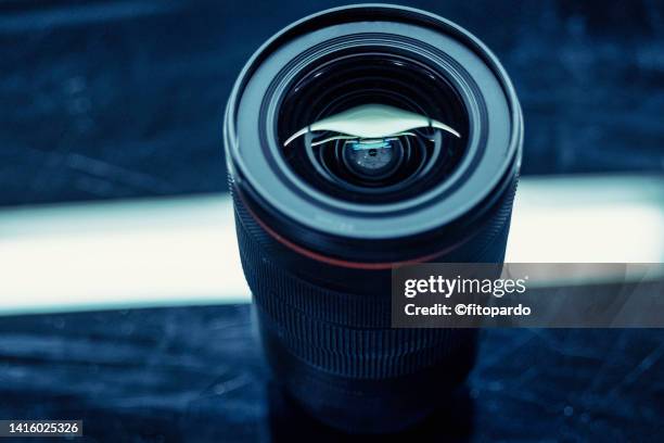 a shiny camera lens - camera lens flare stock pictures, royalty-free photos & images