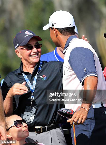 Tiger Woods of the USA and the Albany Team on the 1st tee with Joe Lewis during the first day of the 2012 Tavistock Cup at Lake Nona Country Club on...