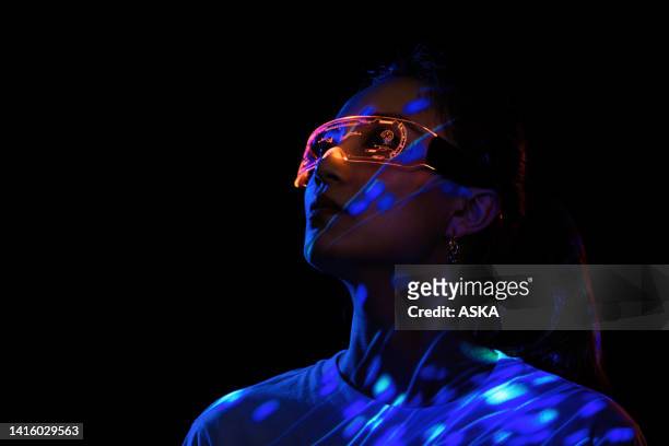 metaverse digital cyber world technology, man with virtual reality vr goggle playing ar augmented reality game and entertainment, futuristic lifestyle - arts culture and entertainment stock pictures, royalty-free photos & images