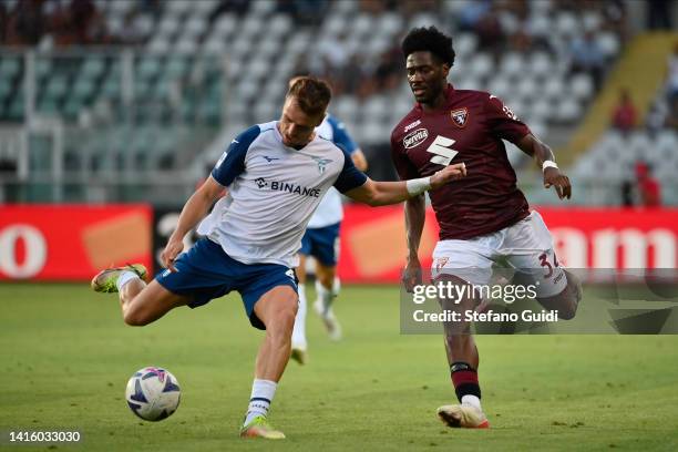 Patric of SS Lazio against Ola Aina of Torino FC during the Serie A match between Torino FC and SS Lazio at Stadio Olimpico di Torino on August 20,...