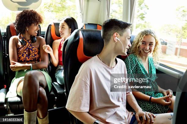 young women traveling on luxury motor coach - coach bus stock pictures, royalty-free photos & images