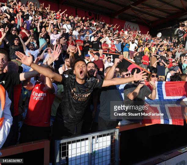 Arsenal fans celebrate after the Premier League match between AFC Bournemouth and Arsenal FC at Vitality Stadium on August 20, 2022 in Bournemouth,...