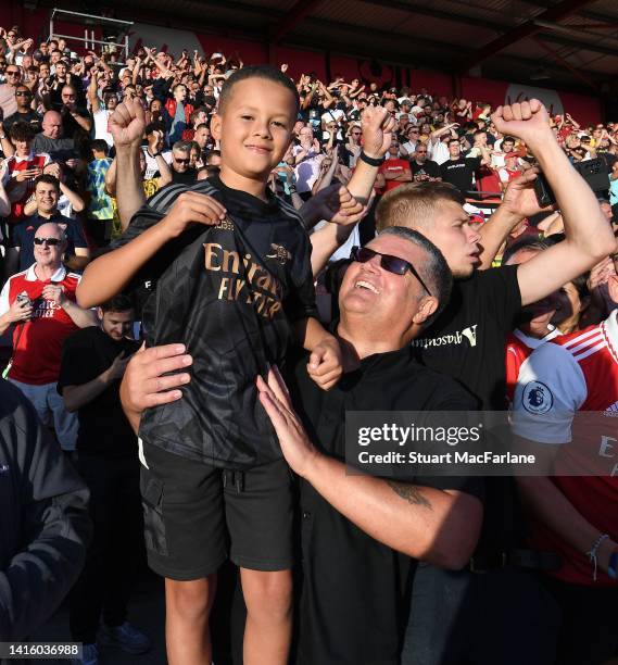 Arsenal fans celebrate after the Premier League match between AFC Bournemouth and Arsenal FC at Vitality Stadium on August 20, 2022 in Bournemouth,...