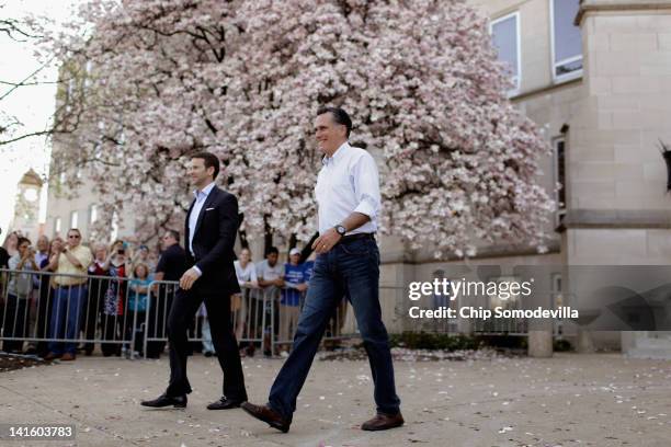 Republican presidential candidate, former Massachusetts Gov. Mitt Romney and Rep. Aaron Schock arrive for a town-hall campaign meeting on the campus...