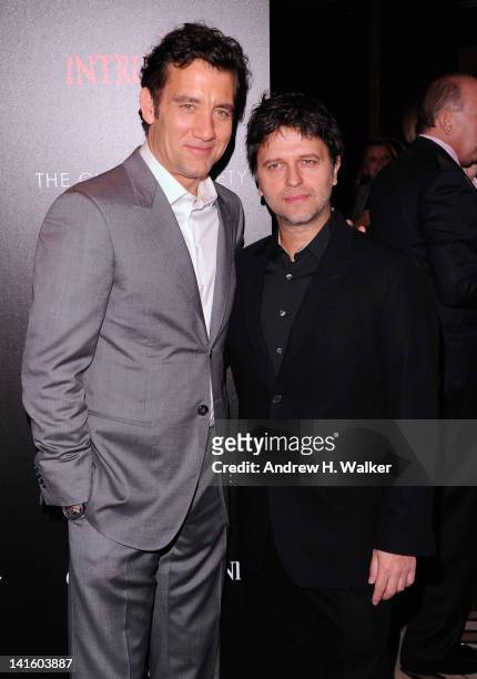 Actor Clive Owen and Director Juan Carlos Fresnadillo attend the Giorgio Armani & The Cinema Society screening of "Intruders" at the Tribeca Grand...