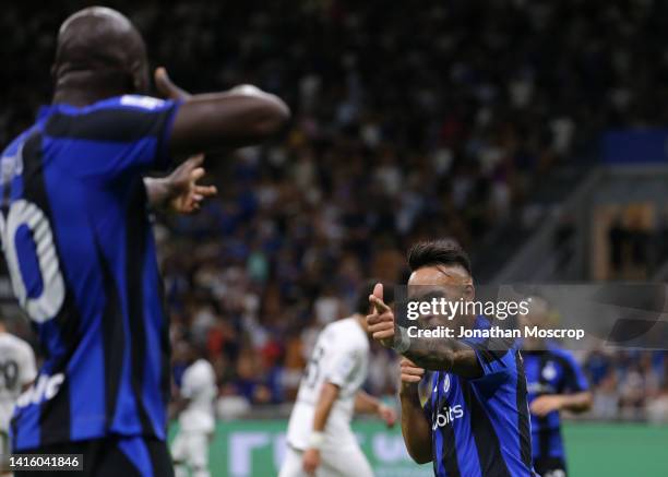 Lautaro Martinez of FC Internazionale celebrates with team mate Romelu Lukaku after scoring to give the side a 1-0 lead during the Serie A match...