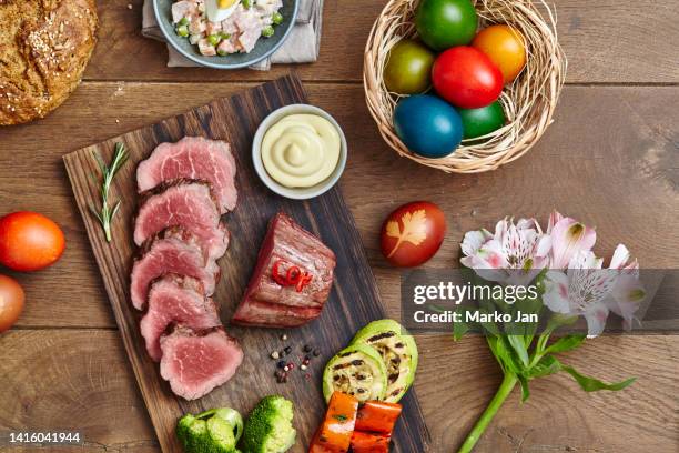 easter eggs with lunch - roast beef dinner stock pictures, royalty-free photos & images