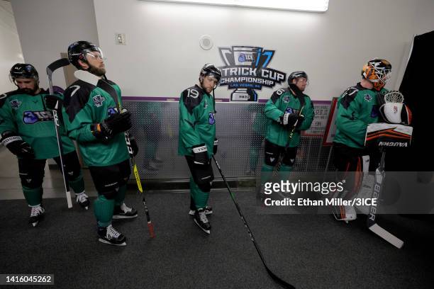 John Schiavo, Colton Hargrove, Chris Mueller, Tim Davison and Eamon McAdam of Team Murphy look on prior to warmups before the semifinal game of the...