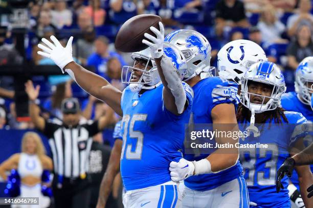 Godwin Igwebuike of the Detroit Lions celebrates a touchdown with his team in the preseason game against the Indianapolis Colts at Lucas Oil Stadium...