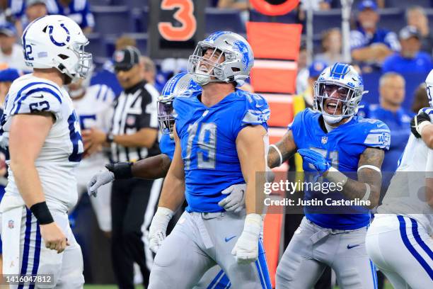 John Cominsky of the Detroit Lions reacts after a play during the fourth quarter in the preseason game against the Indianapolis Colts at Lucas Oil...