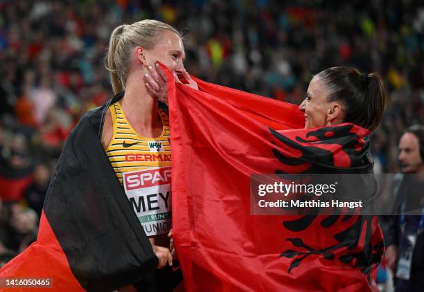 Silver medalist Lea Meyer of Germany and Gold medalist Luiza Gega of Albania celebrate after the Athletics - Women's 3000m Steeplechase Final on day...