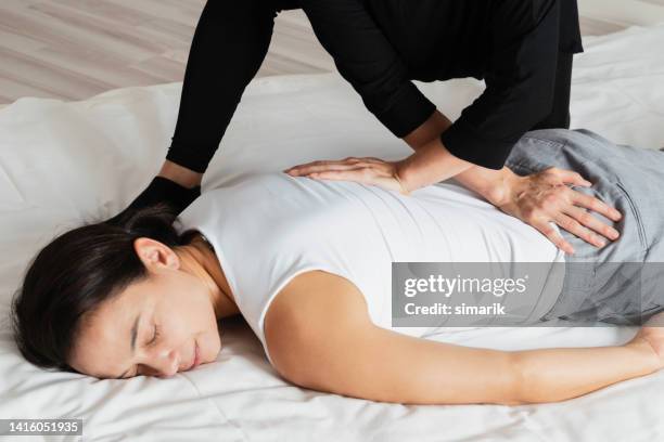 massage - shiatsu stock pictures, royalty-free photos & images