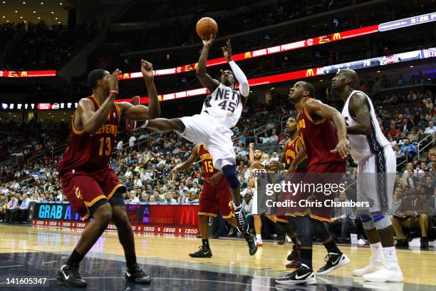 Gerald Wallace of the New Jersey Nets attempts a shot in the second half against Tristan Thompson of the Cleveland Cavaliers at Prudential Center on...