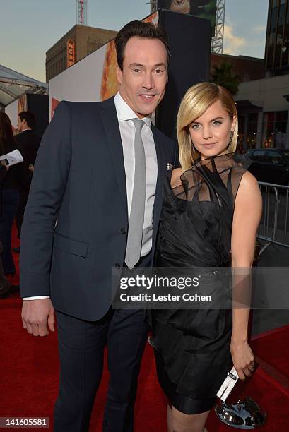 Actors Chris Klein and Mena Suvari arrive at the "American Reunion" Los Angeles Premiere March 19, 2012 in Hollywood, California.