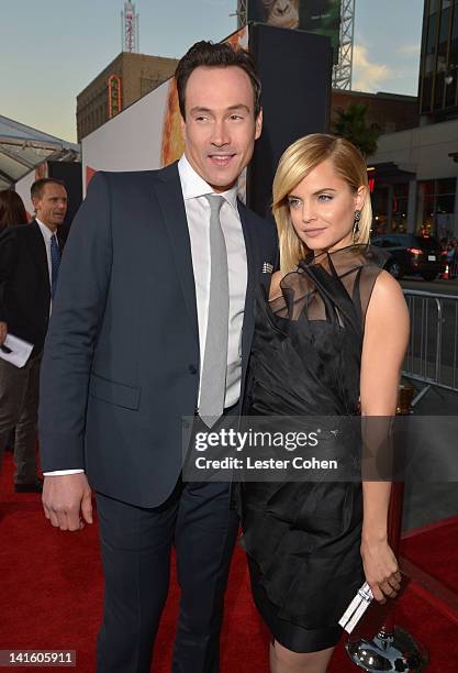 Actors Chris Klein and Mena Suvari arrive at the "American Reunion" Los Angeles Premiere March 19, 2012 in Hollywood, California.