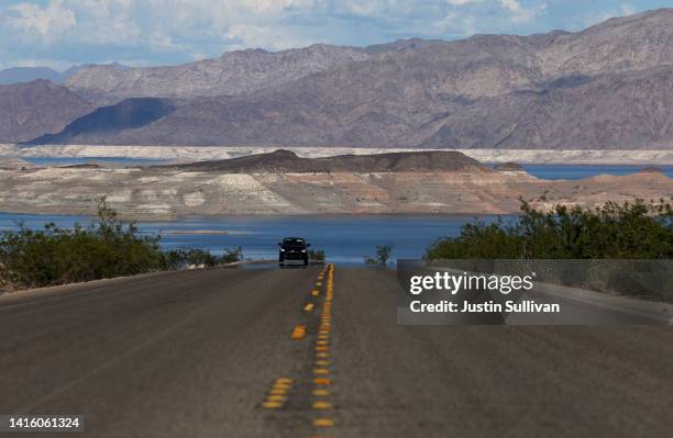 Bleached 'bathtub ring' is visible on the banks of Lake Mead on August 19, 2022 in Lake Mead National Recreation Area, Nevada. The federal government...