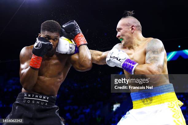 Oleksandr Usyk punches Anthony Joshua during their World Heavyweight Championship fight during the Rage on the Red Sea Heavyweight Title Fight at...