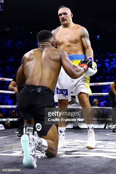 Oleksandr Usyk and Anthony Joshua embrace after their World Heavyweight Championship fight during the Rage on the Red Sea Heavyweight Title Fight at...