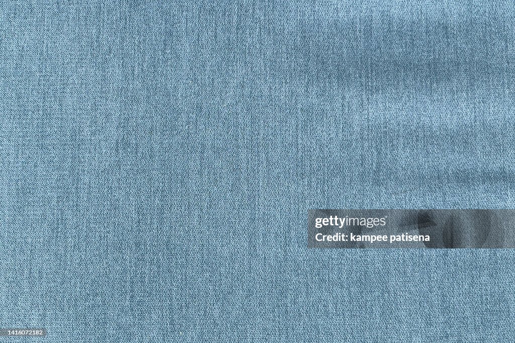 Close up blue fabric texture. Textile background.