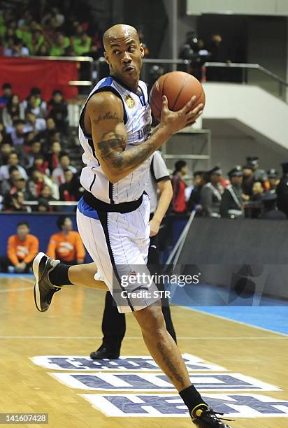 Basket-CHN-CBA,PREVIEW by Robert Saiget This photo taken on March 18, 2012 shows Stephon Marbury of the Beijing Ducks with the ball against the...