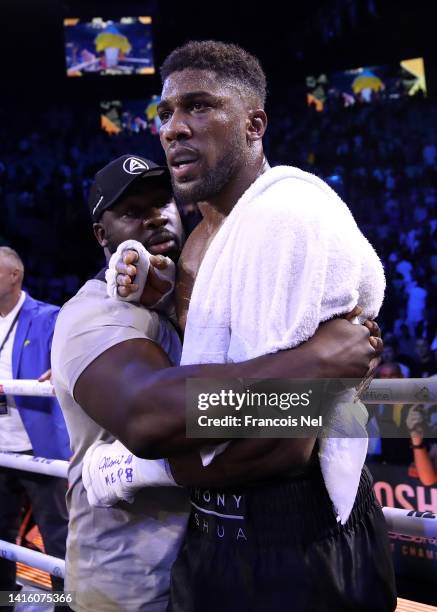 Anthony Joshua looks dejected following their defeat against Oleksandr Usyk in their World Heavyweight Championship fight during the Rage on the Red...