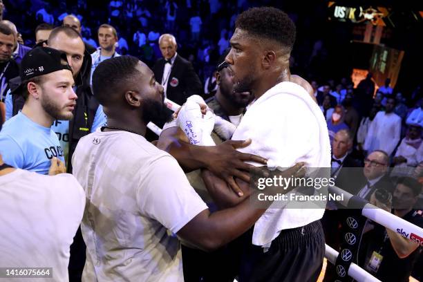 Anthony Joshua looks dejected following their defeat against Oleksandr Usyk in their World Heavyweight Championship fight during the Rage on the Red...