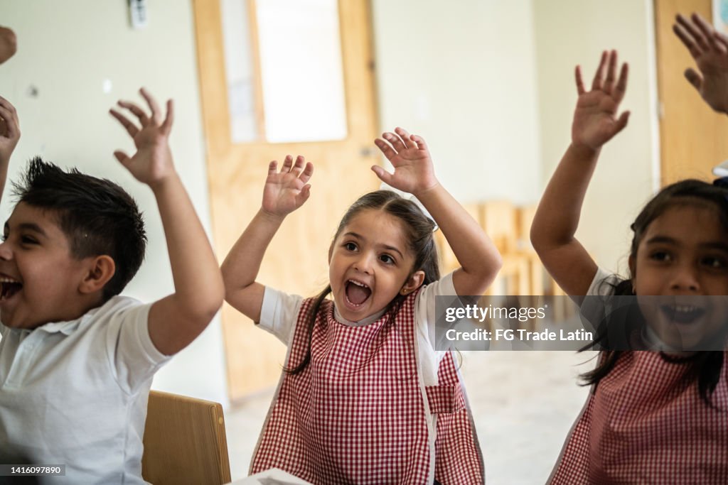 Students celebrating in the classroom