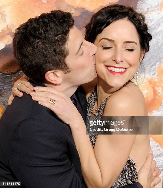 Actors Jason Biggs and wife Jenny Mollen arrive at "American Reunion" Los Angeles Premiere at Grauman's Chinese Theatre on March 19, 2012 in...