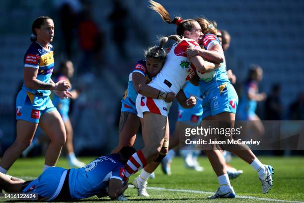 Kezie Apps of the Dragons is tackled during the round one NRLW match between St George Illawarra Dragons and Gold Coast Titans at WIN Stadium on...