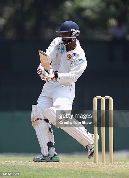 Chamara Silva of Sri Lanka hits out during day one of the tour match between Sri Lanka A and England at the SSC on March 20, 2012 in Colombo, Sri...