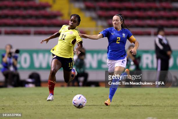 Linda Caicedo of Colombia fights for the ball with Bruninha of Brazil during the FIFA U-20 Women's World Cup Costa Rica 2022 quarterfinals match...