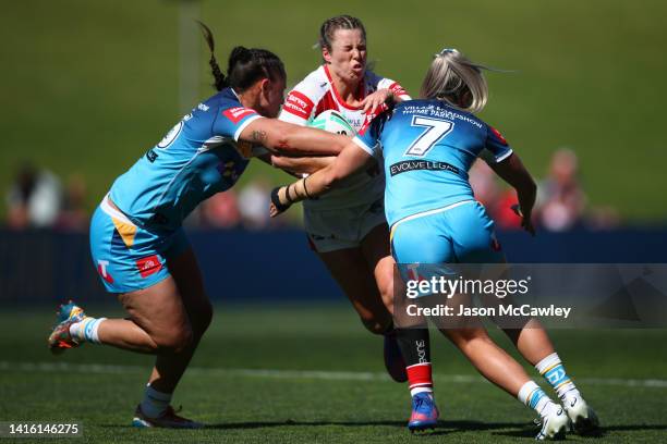 Emma Tonegato of the Dragons is tackled during the round one NRLW match between St George Illawarra Dragons and Gold Coast Titans at WIN Stadium on...