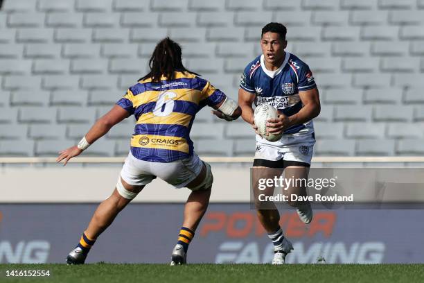 Roger Tuivasa-Sheck of Auckland is challenged by Naitoa Ah Kuoi of Bay Of Plenty during the round three Bunnings NPC match between Auckland and Bay...