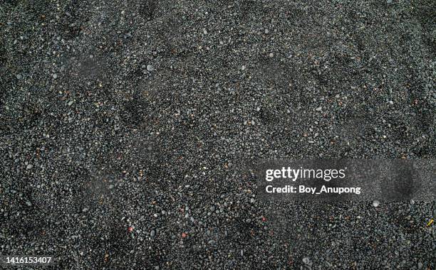 full frame shot of black sand beach background and textured in iceland. - gravel floor stock pictures, royalty-free photos & images