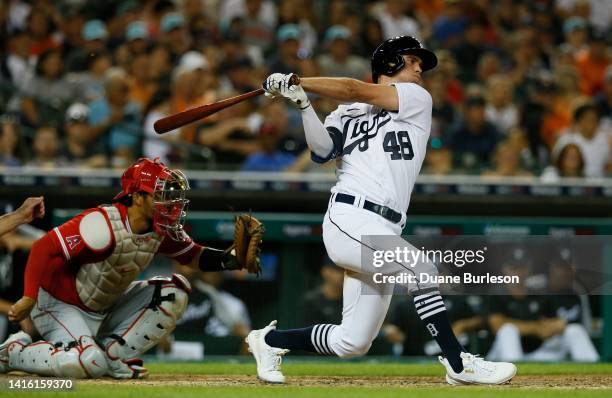 Kerry Carpenter of the Detroit Tigers bats with catcher Kurt Suzuki of the Los Angeles Angels behind the plate during the eighth inning at Comerica...
