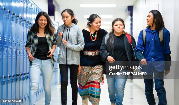 high schoolers walking on a corridor at school - indian bildbanksfoton och bilder