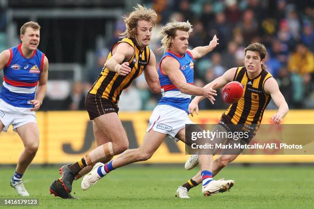 Bailey Smith of the Bulldogs kicks during the round 23 AFL match between the Hawthorn Hawks and the Western Bulldogs at University of Tasmania...